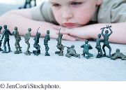 boy with toy soldiers